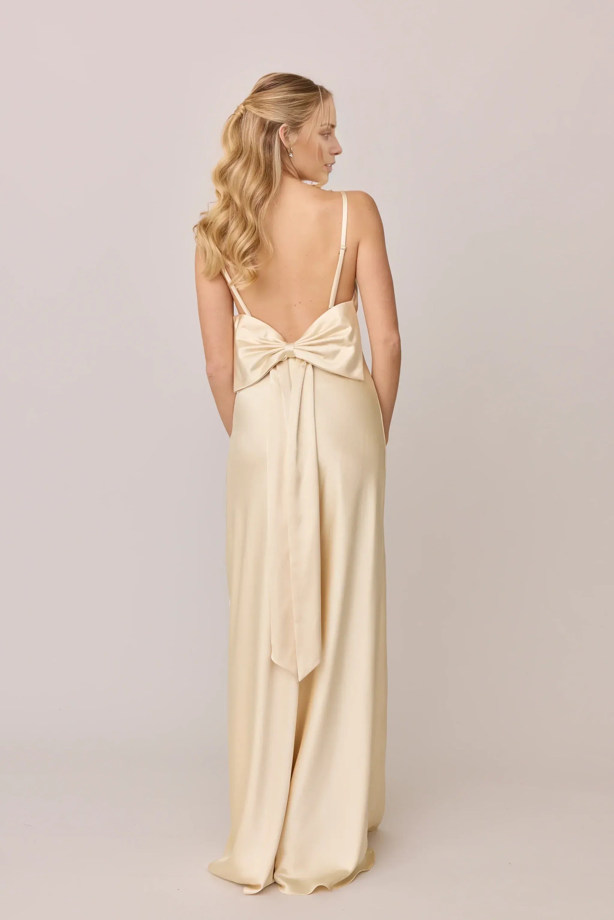 Champagne Spaghetti Strap Cowl Back Big Bow High Slit Floor Length A Line Satin Bridesmaid Dress