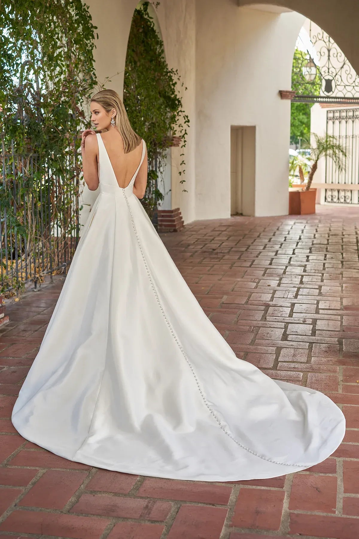 Classic Deep V Sleeveless Satin A‑Line Low Back Pocket Floor Garden Wedding Dress