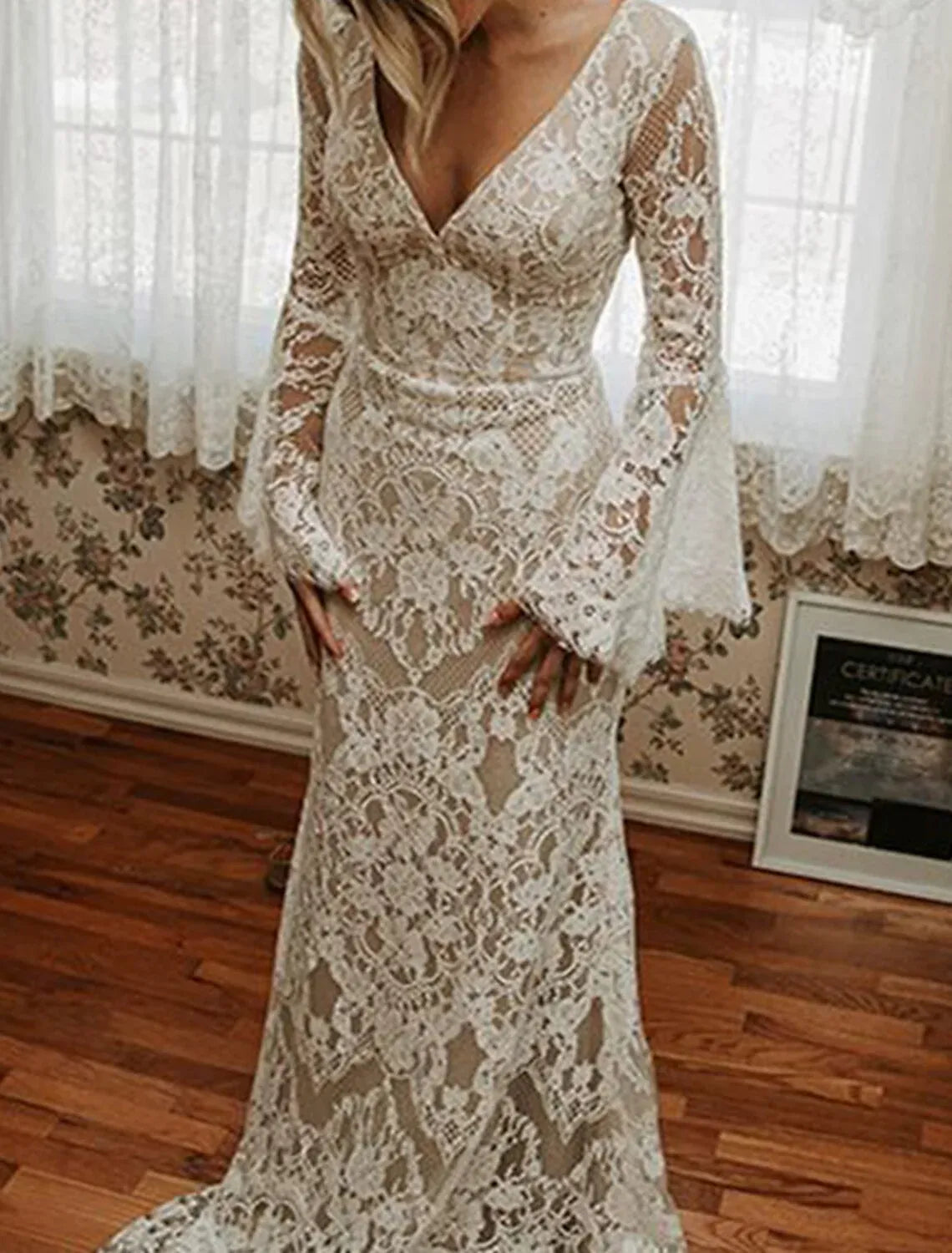 Long‑Bell‑Sleeve V‑Neck Sheer‑Lace Mermaid Boho Wedding Dress With Low‑Back Detail