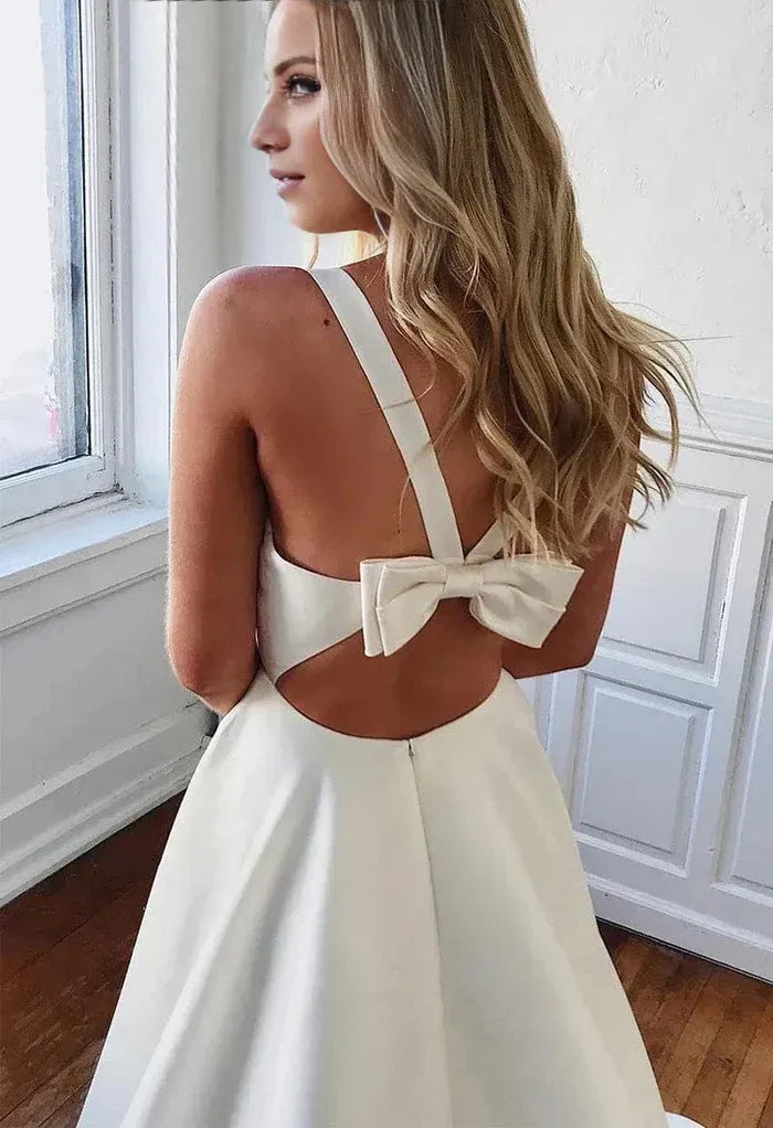 Modern A-Line Plunge V Wide Strap Cutout Bow Back Train Wedding Dress