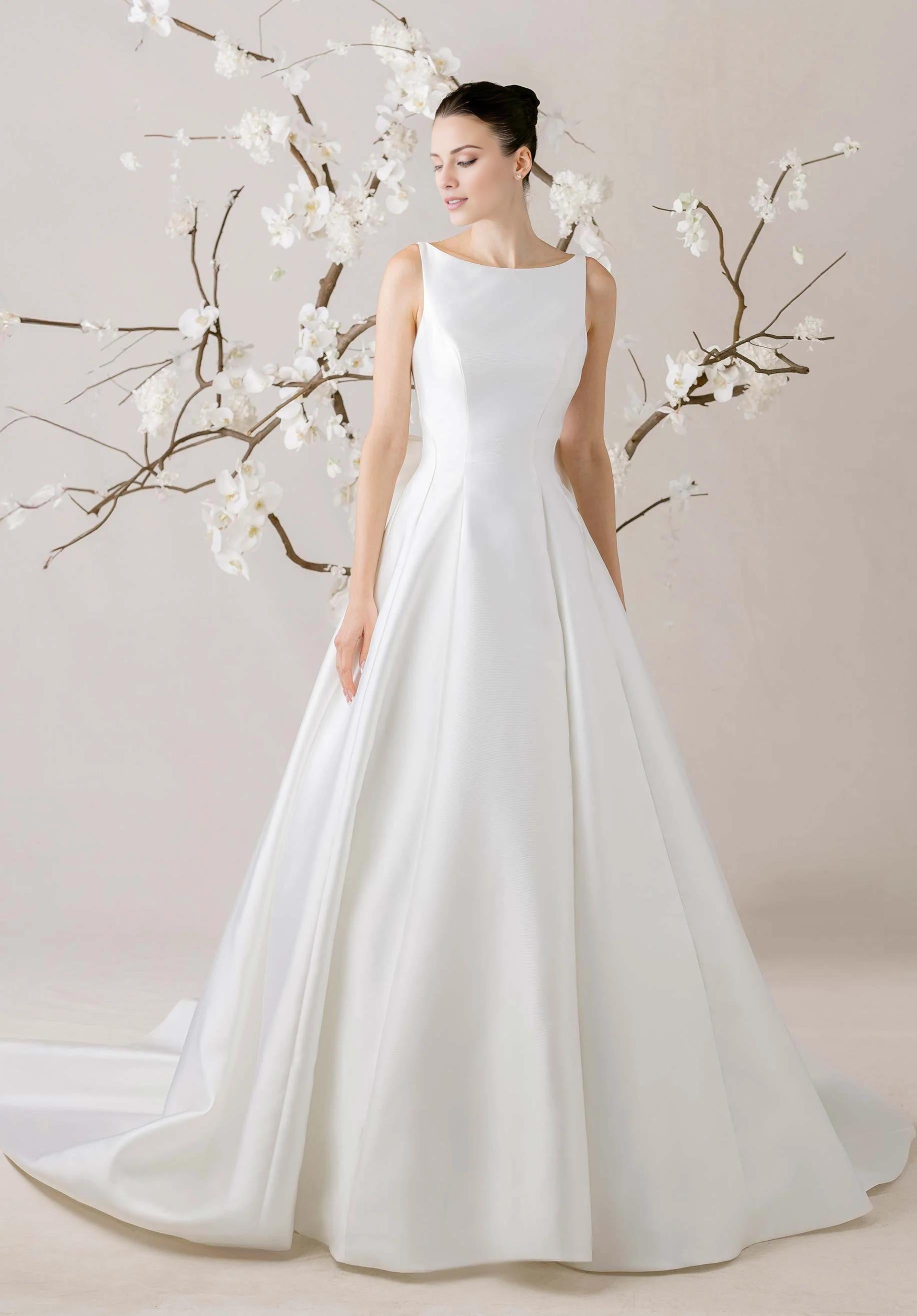 Modern Satin Ball Gown Wedding Dress with Keyhole Back and Oversized Bow Detail