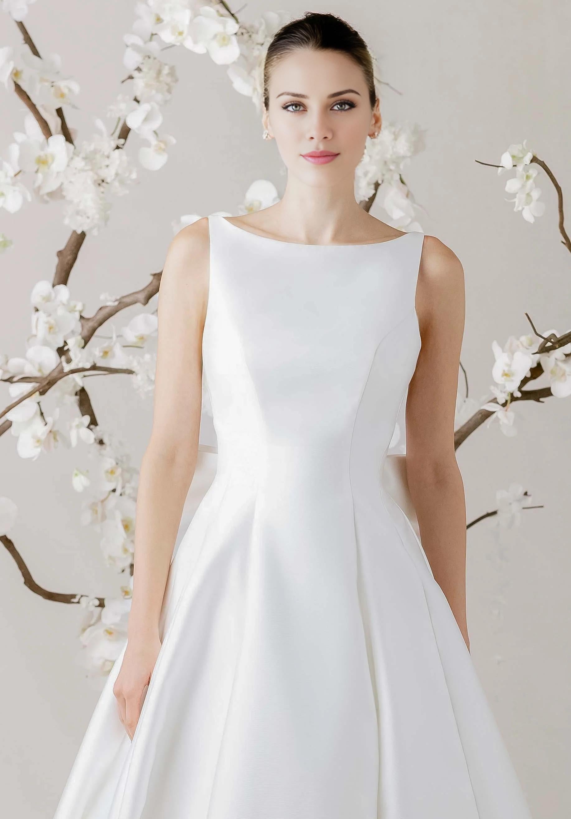 Modern Satin Ball Gown Wedding Dress with Keyhole Back and Oversized Bow Detail