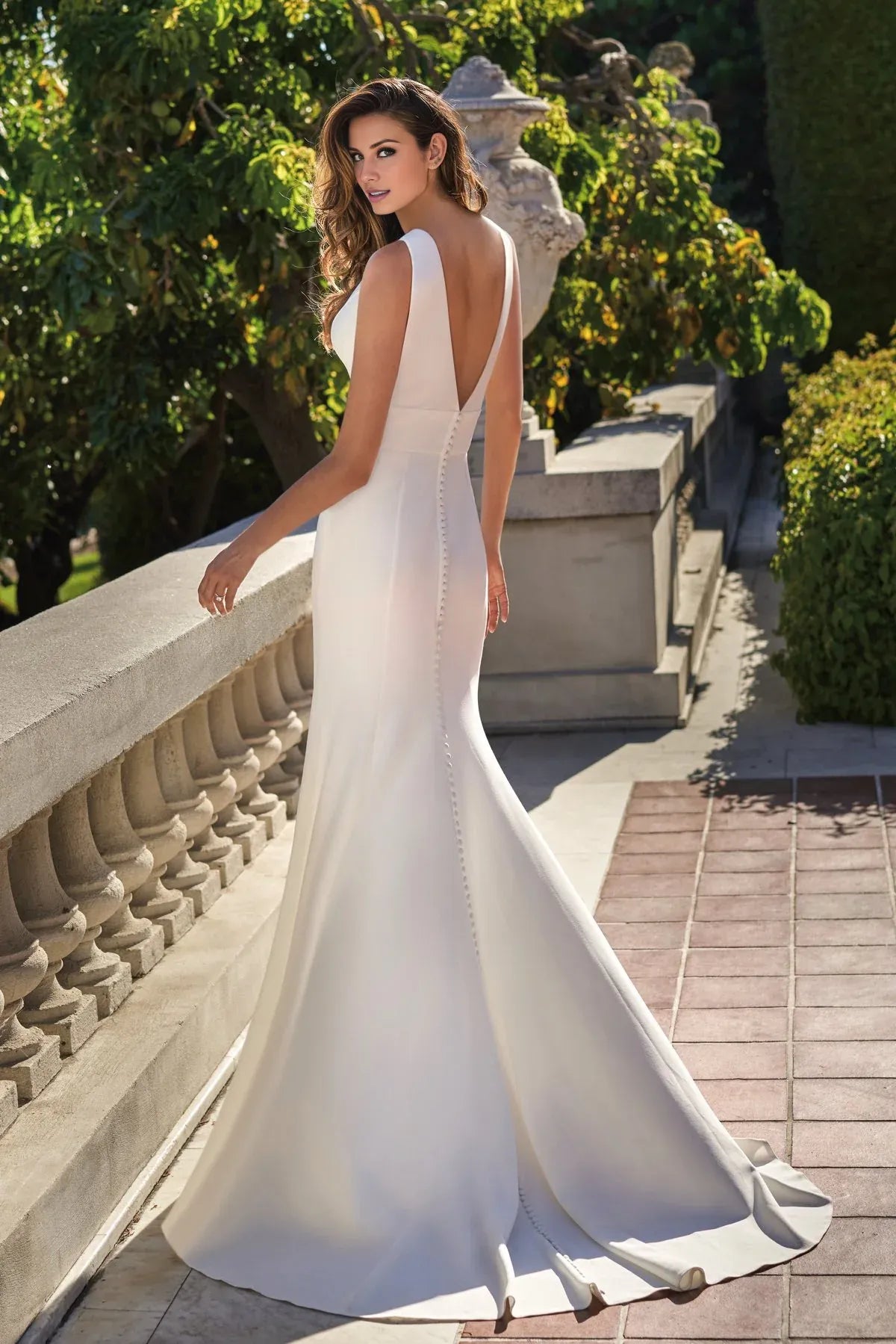Sleeveless Plunging‑V‑Neck Crepe Mermaid Wedding Dress With Pearl‑Button‑Back Detail