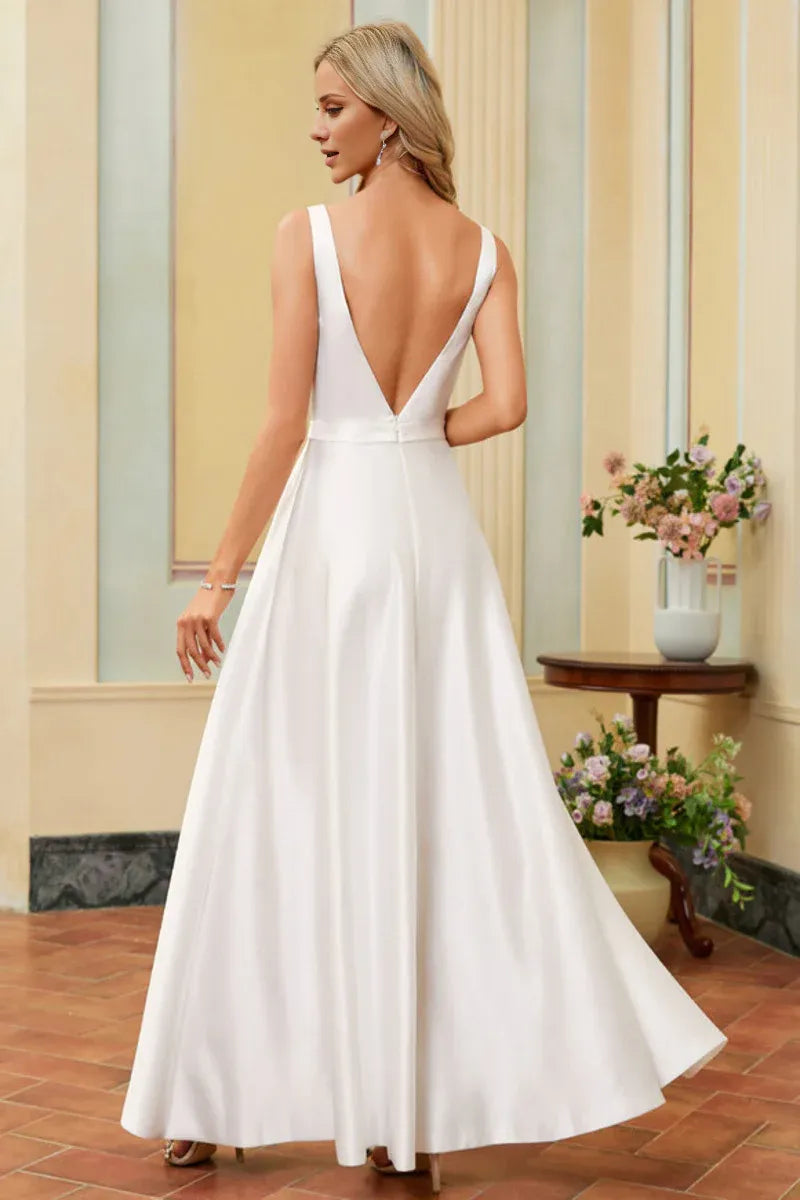 Spaghetti‑Strap Deep‑V‑Neck Satin A‑Line Wedding Dress With Pockets & Low‑V‑Back Detail