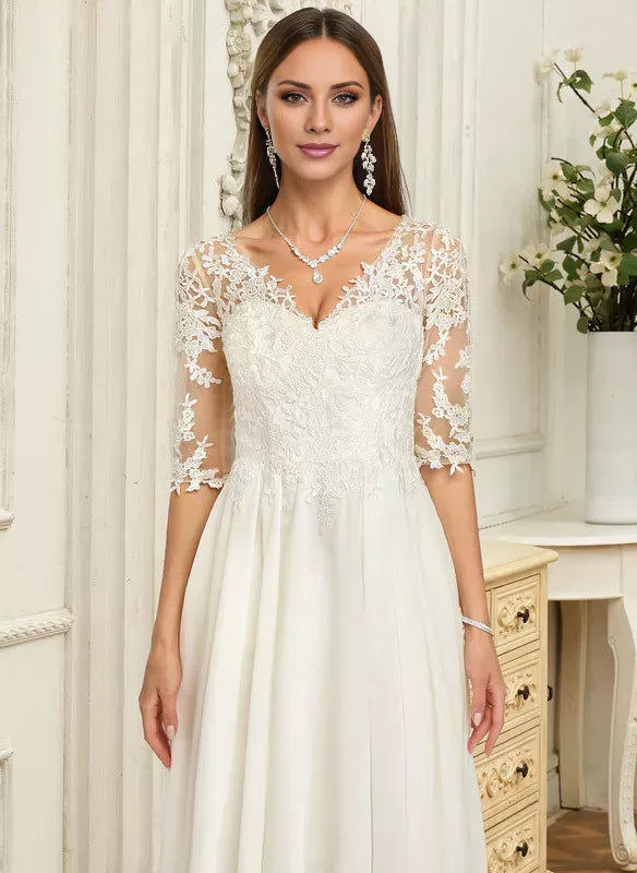 Three‑Quarter‑Sleeve Floral‑Lace High‑Low Satin Wedding Dress With Illusion‑Back Detail