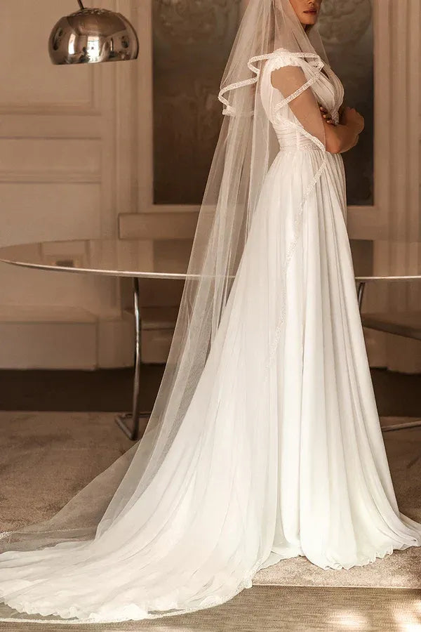 Bohemian Plunging V-Neck Cap-Sleeve A-Line Floor-Length Wedding Dress